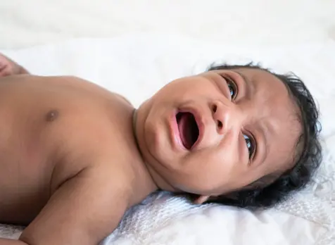 Crying newborn to draw attention soothing strategies and emotional support